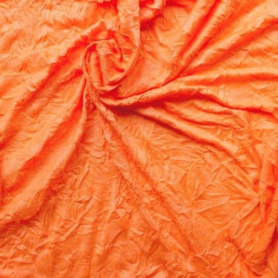 Tissu en jersey froissé et flammé orange
