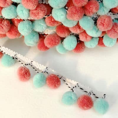 Strap with mint green and melon pompoms 