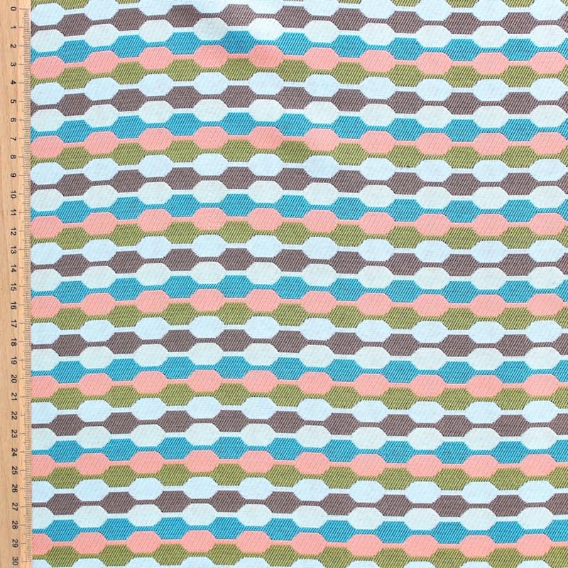 Tissu en coton à motifs géométriques rouge, bleu, vert et blanc sur fond brun