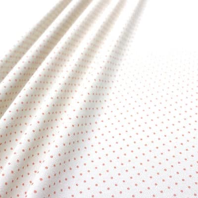 Tissu en coton imprimé de petits pois sur fond blanc