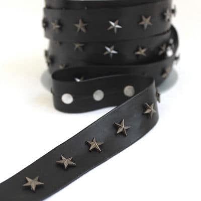 Black imitation leather belt with pressed stars
