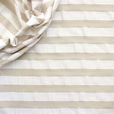 Clothing fabric striped in relief white and beige