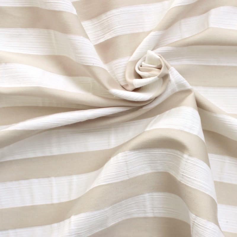 Clothing fabric striped in relief white and beige