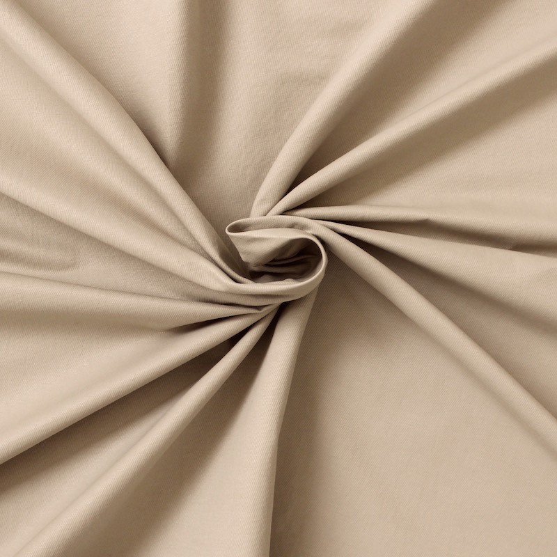 Tissu vestimentaire uni finement sergé beige