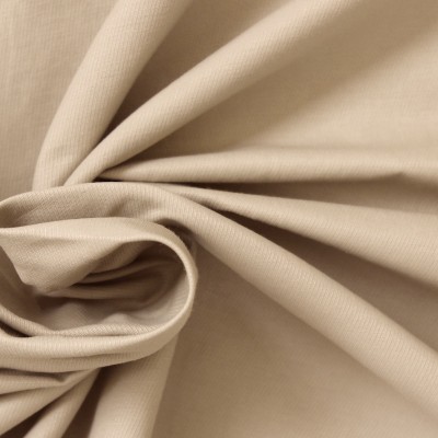 Tissu vestimentaire uni finement sergé beige