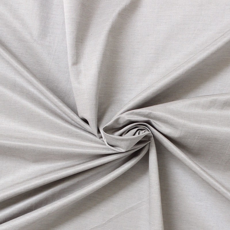 Tissu vestimentaire uni finement sergé métallisé