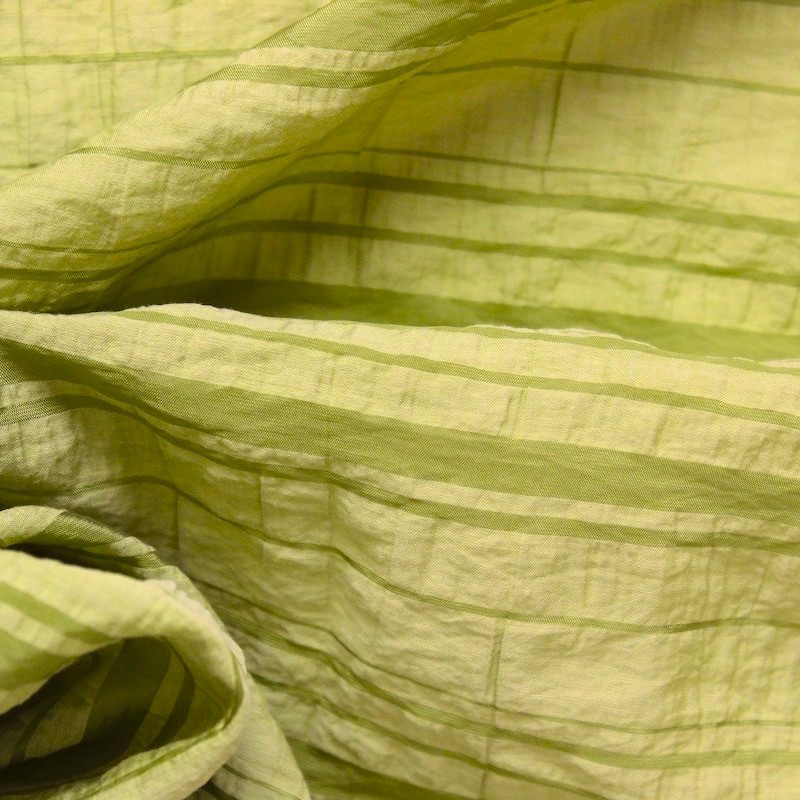 Fabric with mixed material with green stripes 