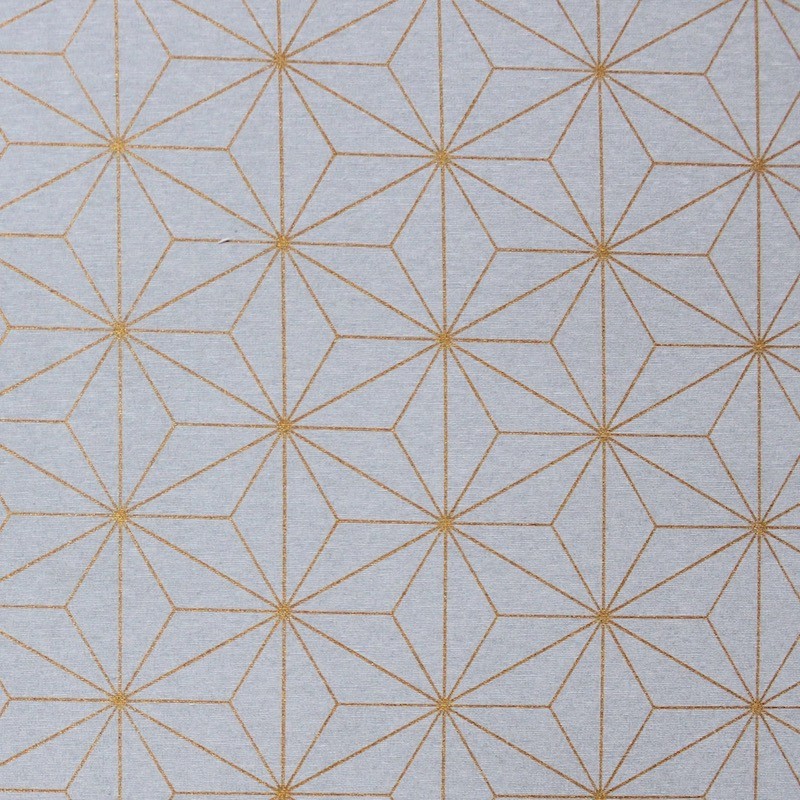 Tissu d'ameublement à motif géométrique doré sur fond gris