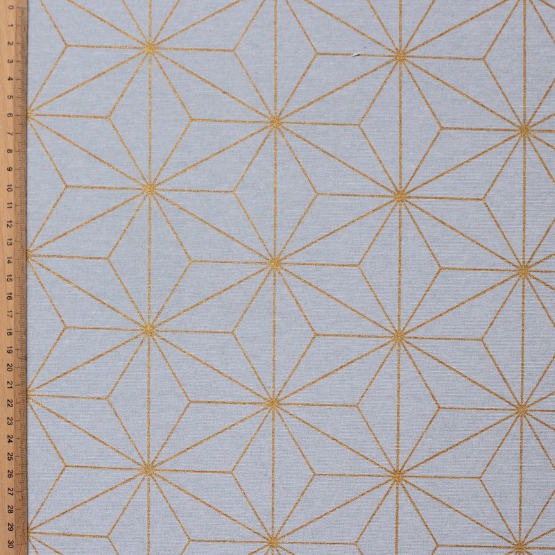 Tissu d'ameublement à motif géométrique doré sur fond gris