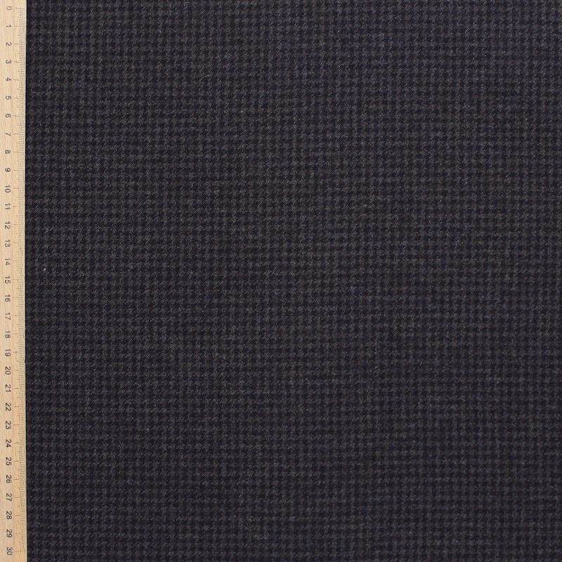 Woolen fabric with large houndstooth pattern in grey tones