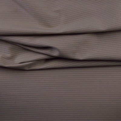Katoen met witte strepen op een bruine achtergrond