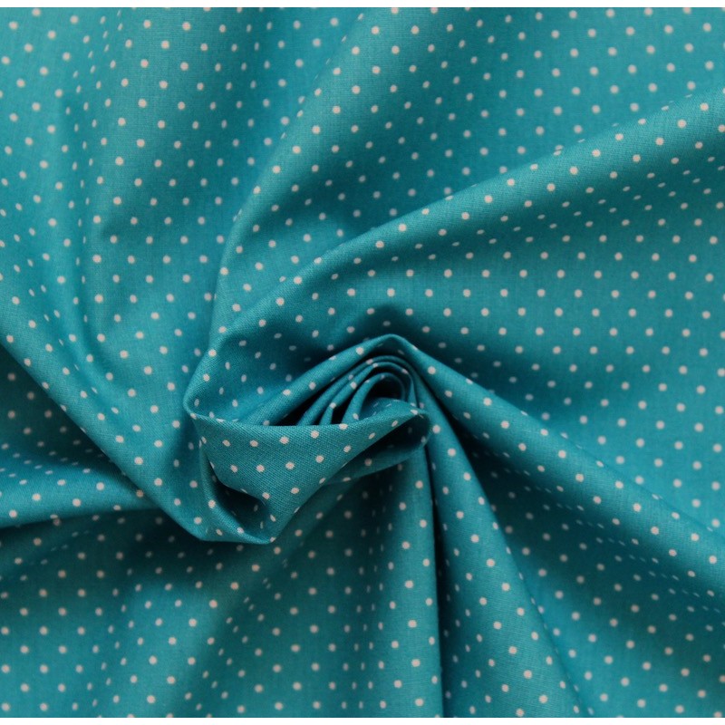 Tissu en coton à pois sur fond bleu turquoise