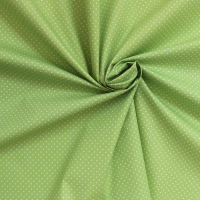 Tissu en coton à pois sur fond vert citron