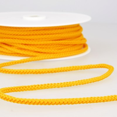 Gold yellow knitted rope