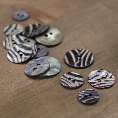 Vintage pearly button with zebra stripes
