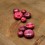 Round resin button - pearly raspberry