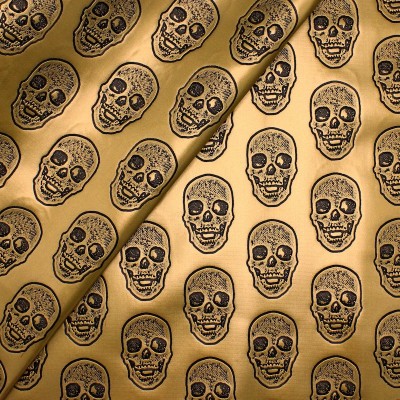 Faux leather with head skulls - gold