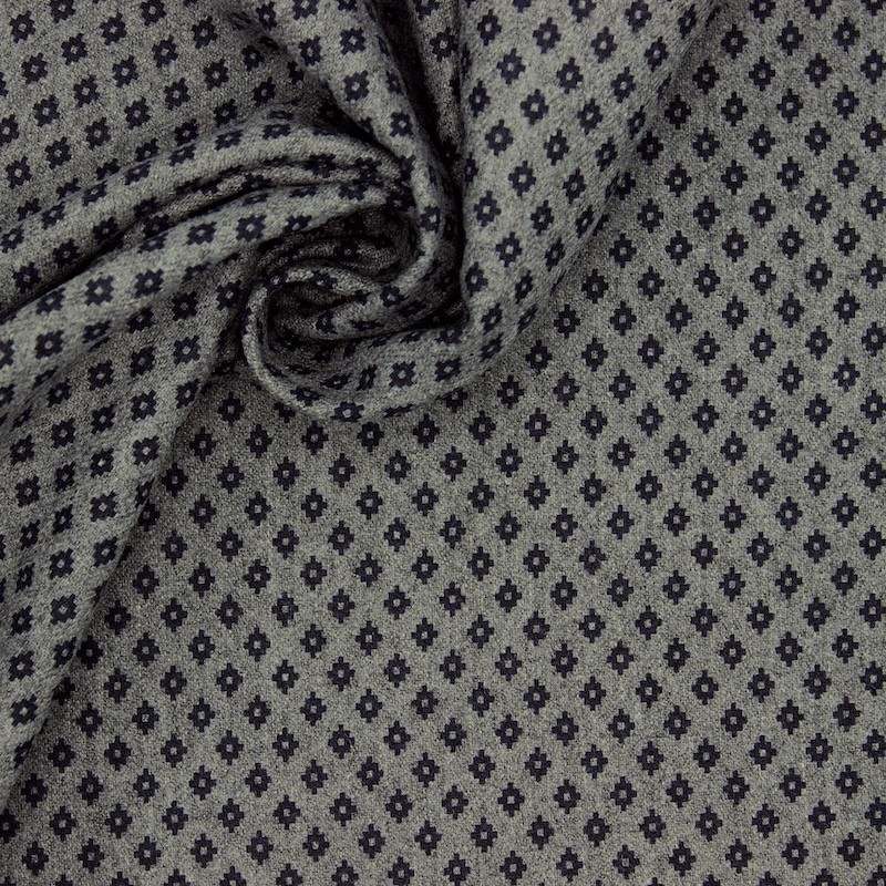 Fabric in wool and polyester with small patterns 