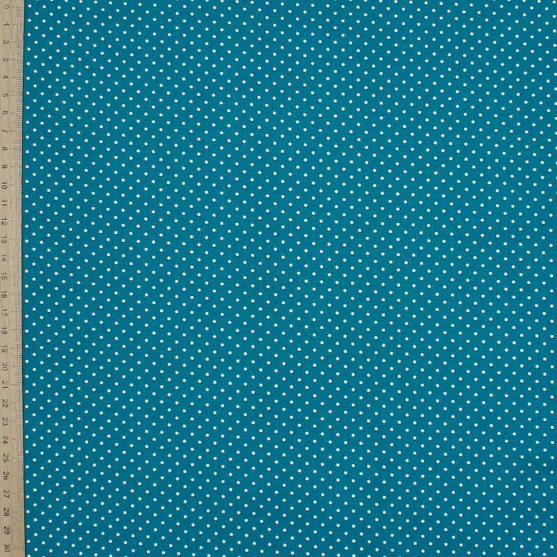 Tissu en coton à pois sur fond bleu
