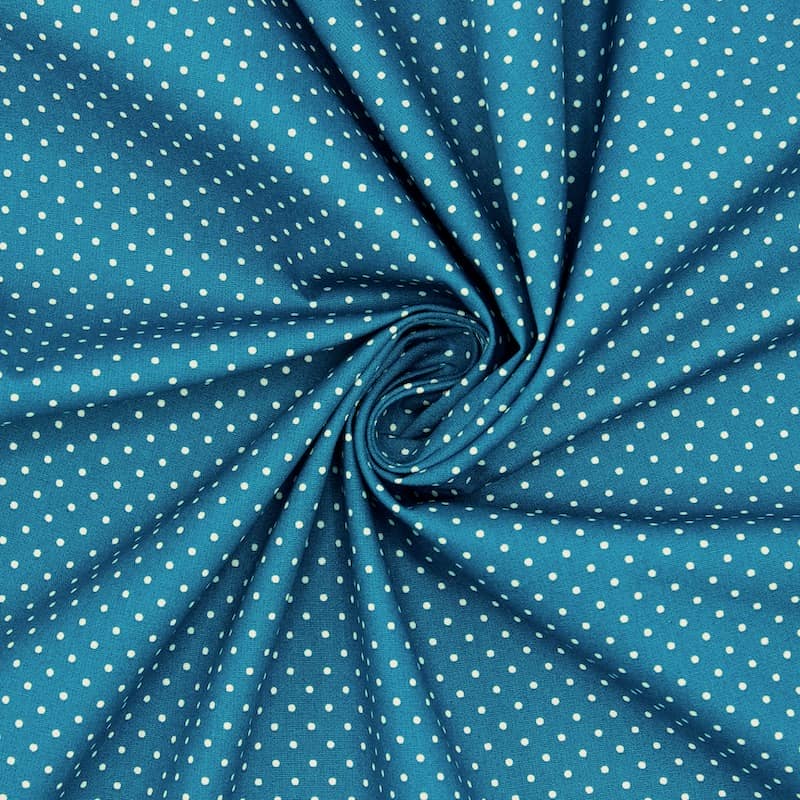 Tissu en coton à pois sur fond bleu