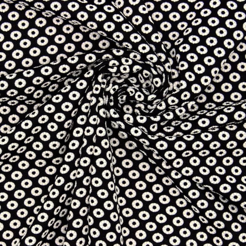 Extensible fabric with relief pattern
