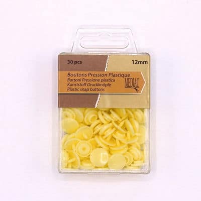 Box with 30 snap buttons - pale yellow