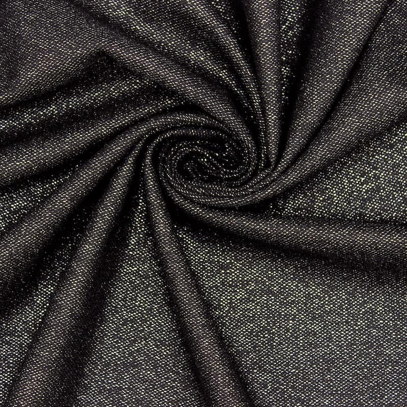 Zwarte stof met zilveren lurex draad