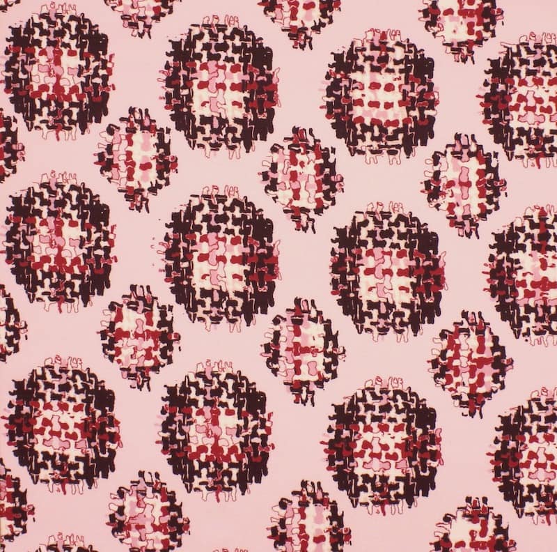 Extensible printed fabric with pink background