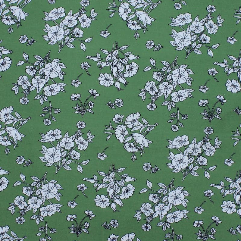 Tissu cretonne à fleurs sur fond vert