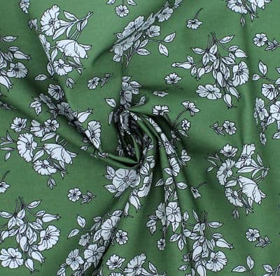 Tissu cretonne à fleurs sur fond vert