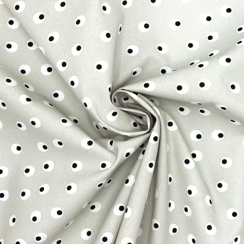 Tissu en coton imprimé oeufs durs sur fond gris