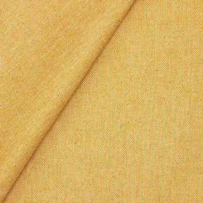 Tissu en coton enduit jaune