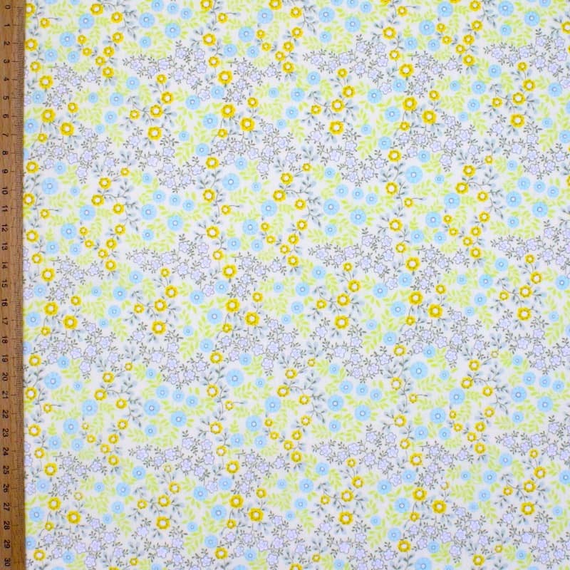 Tissu en coton jaune à motif floral