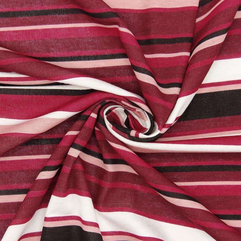 Jerseystof met roze, bordeaux, witte en zwarte strepen