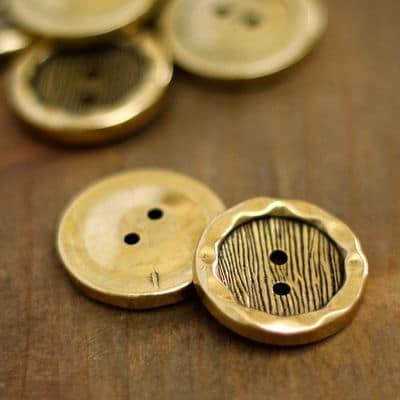 Round button with metal aspect - gold 