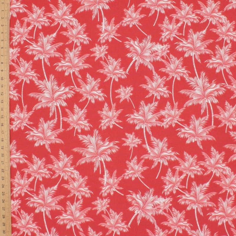 Popeline de coton rouge imprimé palmiers
