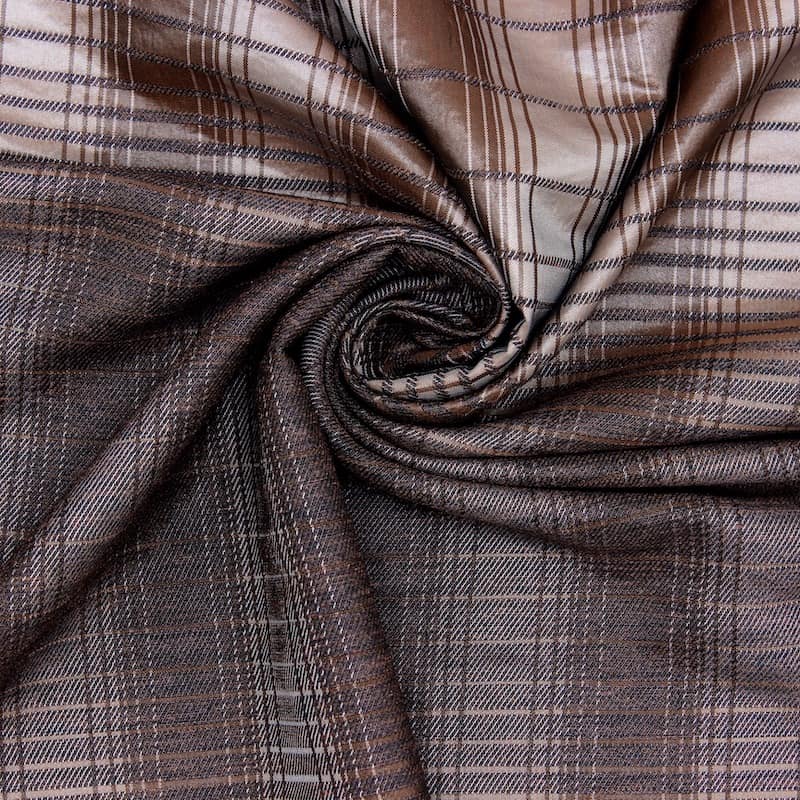 Tissu vestimentaire brun à carreaux