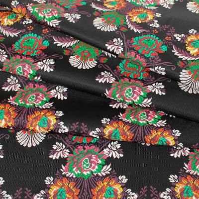 Tissu imprimé floral sur fond noir