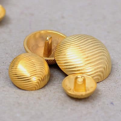 Vintage knoop in metaal - goud