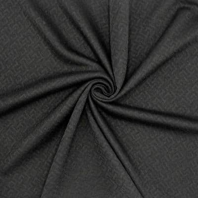 Embossed knit fabric in polyester - black 