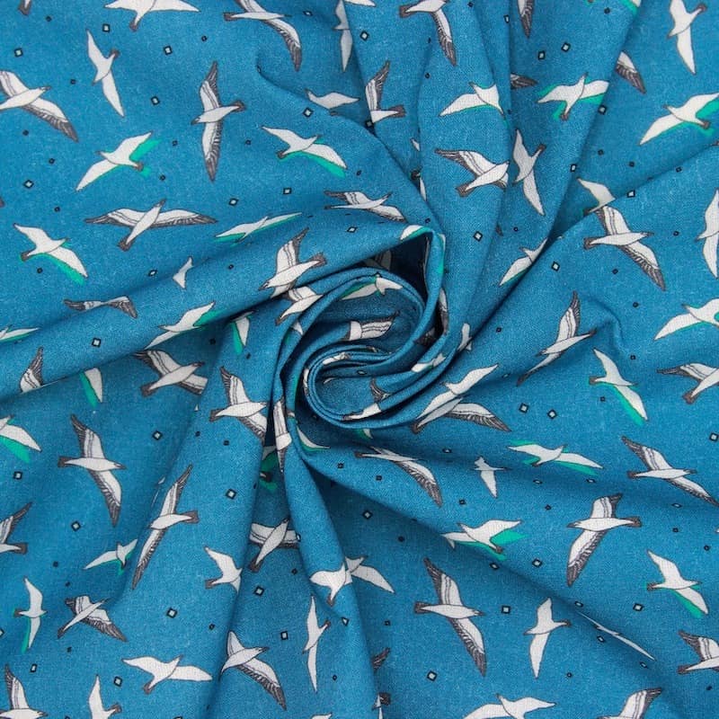 Cotton printed with "seagull" - peacock-colored