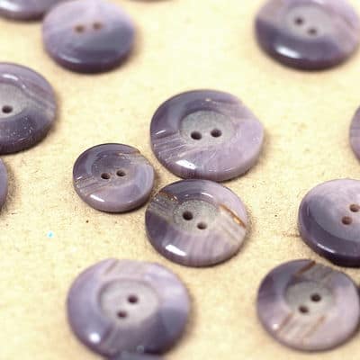 Round button - lavender-colored