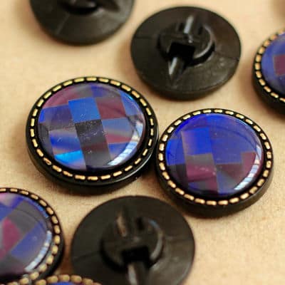 Black button with pearly blue mosaic