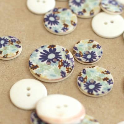 Resin button with flowers