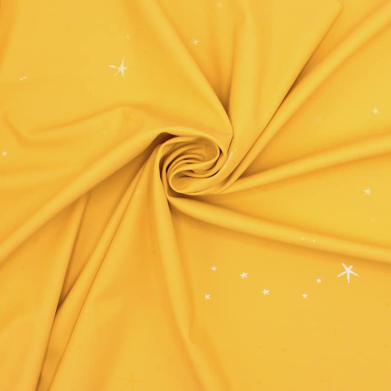 Tissu imperméable étoiles - jaune