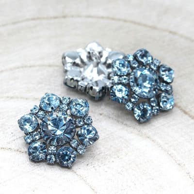 Nikkel en kristal knoop - blinkend blauw
