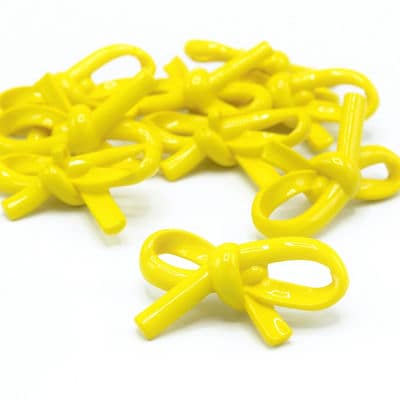 Bouton en forme de noeud jaune