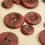 Marbled resin button - brick red and black