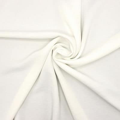 Extensible fabric crêpe type - vanilla-colored