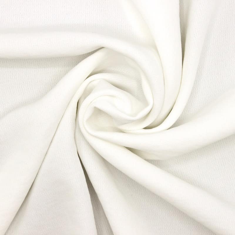 Extensible fabric crêpe type - vanilla-colored
